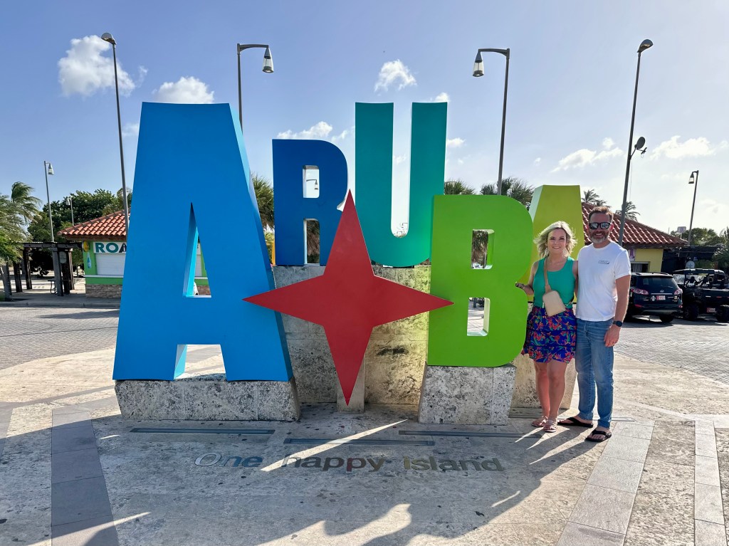 aruba welcome sign, one happy island